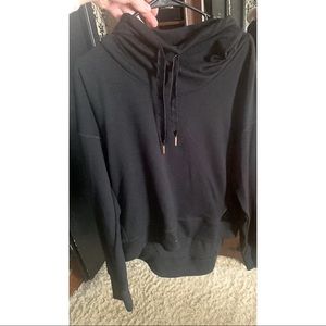 Running sweater, has suede on the side.